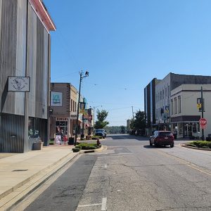 Small town street lined with multistory businesses