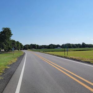 Country road entering small community