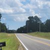 Country road entering tiny community