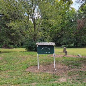 Tiny cemetery with few gravestones