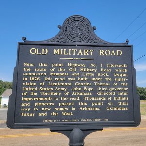 Historical sign giving information about the Old Military Road through the area