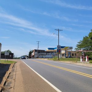 Small town street scene with businesses lining street