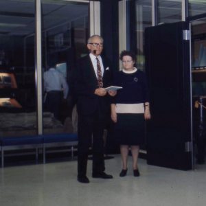 Older white man and white woman in formal dress