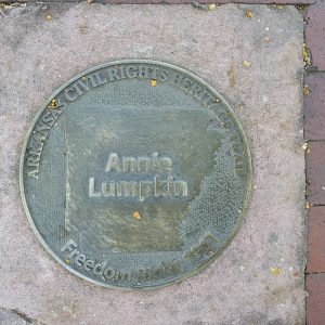 Round metal marker with words