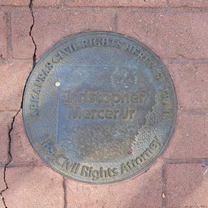 Round metal marker with words