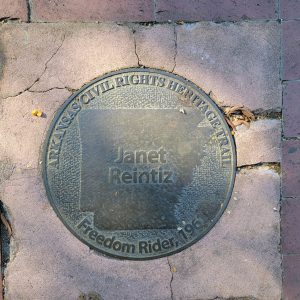 Round metal marker with words