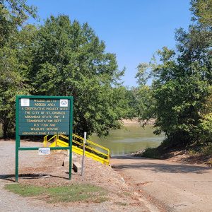 Sign pointing to river access