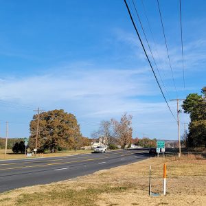 Four-lane small highway entering small town