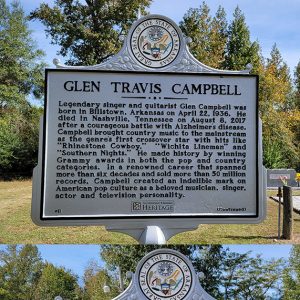 Metal markers with text regarding Glen Campbell