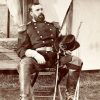 Bearded white man in military garb