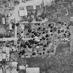 View of a cemetery and surrounding area from high in the sky