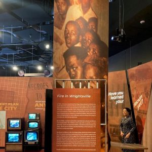 Poster featuring African American boys and text