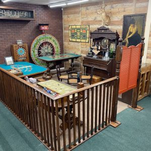 Museum room full of casino games and tables