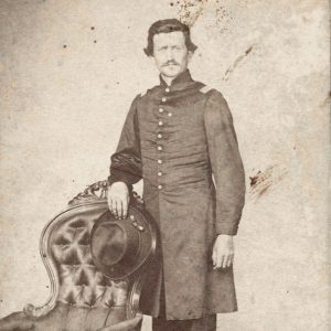 White man in military garb with mustache