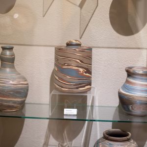 Vases in a display case