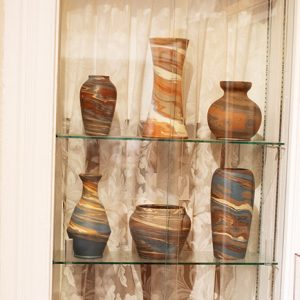 Vases in a display case