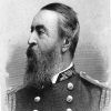 Bearded white man in military garb