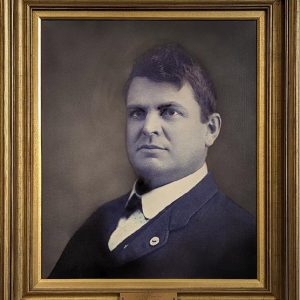 Portrait of white man in suit and stiff white collar