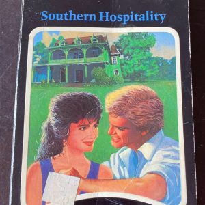 Book cover featuring a white couple in front of a mansion