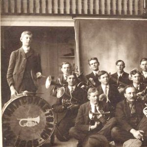 Group of white musicians with brass instruments