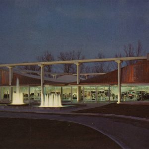 Car museum exterior with fountains in front