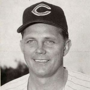 White man in baseball uniform and cap