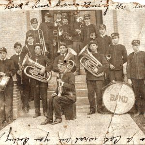 White young men in military dress with instruments