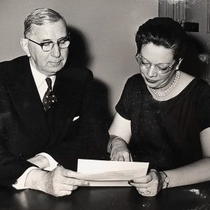 White man in suit and white woman in dress