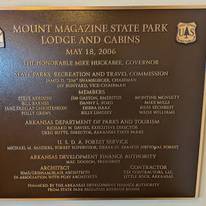 Bronze plaque with information about Mount Magazine's lodges and cabins opened in 2006