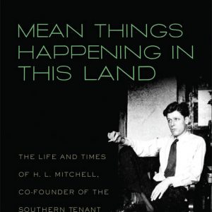 Book cover showing a man in a white shirt and dark tie sitting in a chair with one leg up