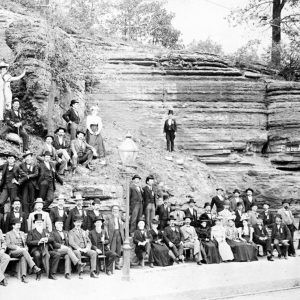 Large group of white people dressed formally