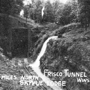 railroad tracks entering a tunnel "three miles north skyvue lodge"