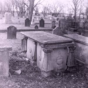 Above ground crypts and gravestones in a cemetery