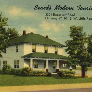 A postcard with a picture of a multistory white house with green roof and covered porch with columns