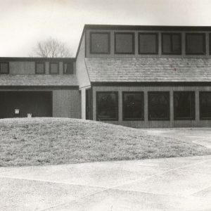 Multistory building with large windows on the ground floor and upper floor