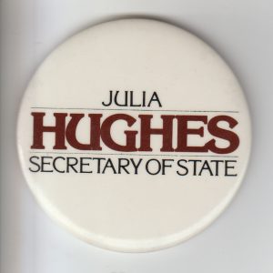 Round button with text "Julia Hughes Secretary of State"
