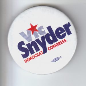 Round button text "Vic Snyder Democrat Congress" with star shape illustration above the letter I in Vic