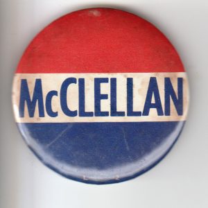 Round button horizontal stripe in the middle text "McClellan"