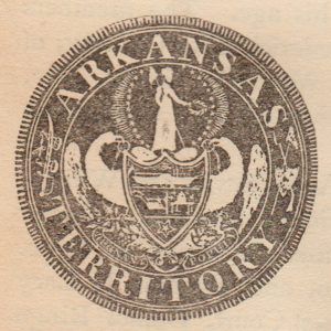 Text "Arkansas Territory" around illustration angel of liberty holding wreath standing on top of shield above banner of text "regnant populi"